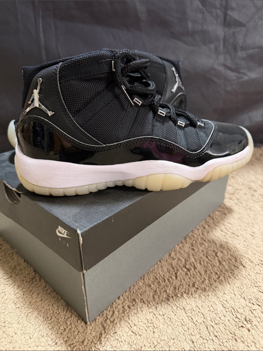 Jordan Kids Black and White High-Top Sneakers